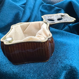 Mahogany tone enameled trinket box with jeweled quatrefoil lid and pearl accent