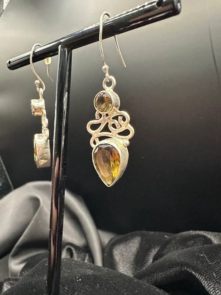 Silver-tone openwork scroll drop earrings with round and teardrop amber-toned stones, view 4