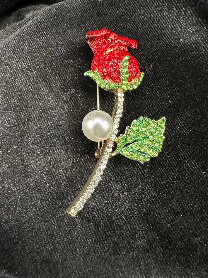 Red rosebud brooch with green leaves, gold-tone stem lined with clear stones and faux pearl accent, view 5