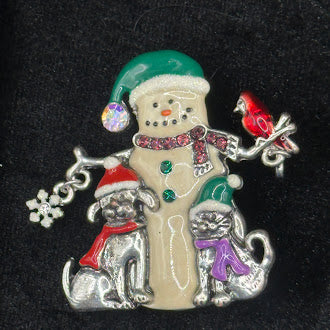Silver-tone Christmas brooch of a snowman with two cats and a red cardinal in enamel and rhinestones, view 2