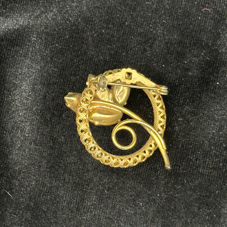 Gold-tone filigree wreath brooch with pink marquise rhinestone flower and swirl stem, view 2