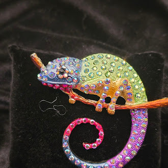 Gold-tone chameleon brooch with multicolor pavé rhinestones and curled tail on a branch, view 2