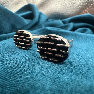 Vintage silver tone oval tie tack set with black enamel geometric pattern and chain back