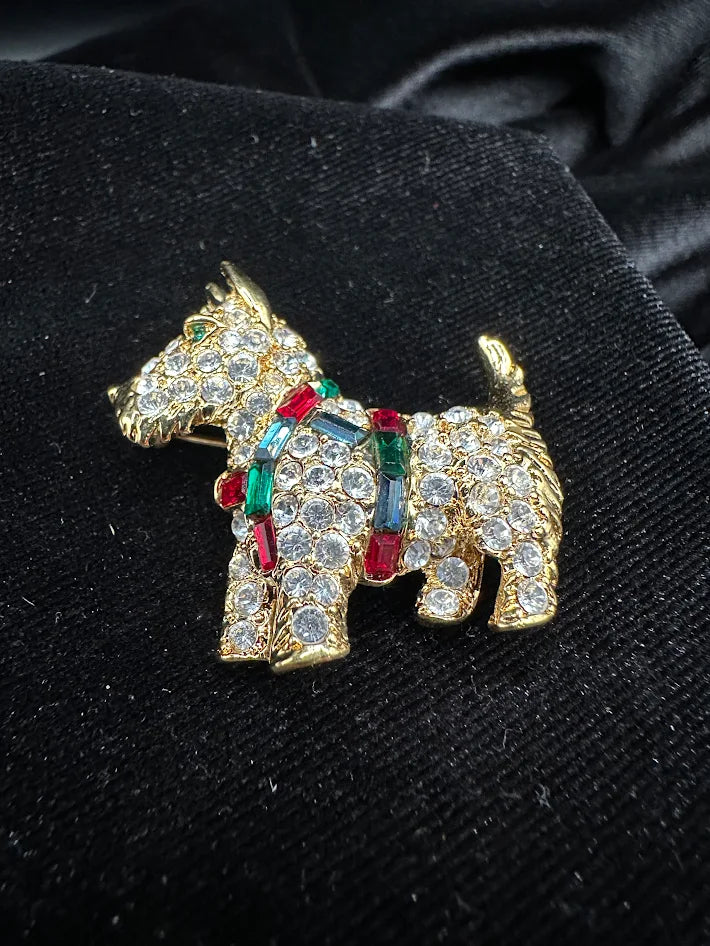 (SIGNED?) Gold tone terrier brooch with clear red green and blue crystals