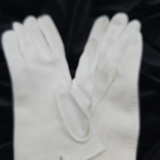 White ladies dress gloves with visible age spots, view 6