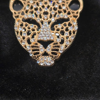 Gold-tone openwork leopard face brooch with clear rhinestone accents, view 2