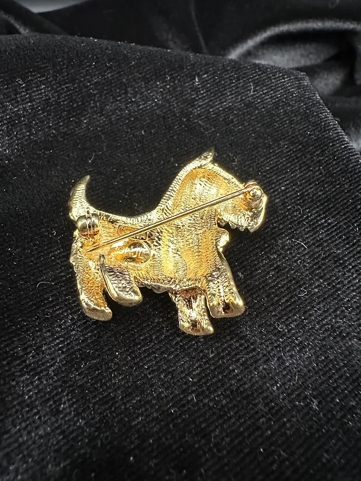 (SIGNED?) Gold tone terrier brooch with clear red green and blue crystals