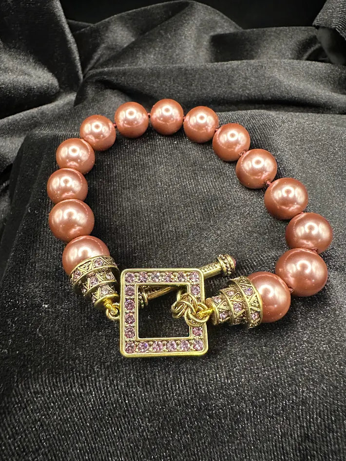 Heidi Daus Faux Pearl Bracelet Mauve Beaded Crystal Pave Clasp Gold Tone Statement Designer