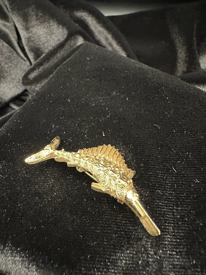 Gold tone marlin brooch with textured fin detail