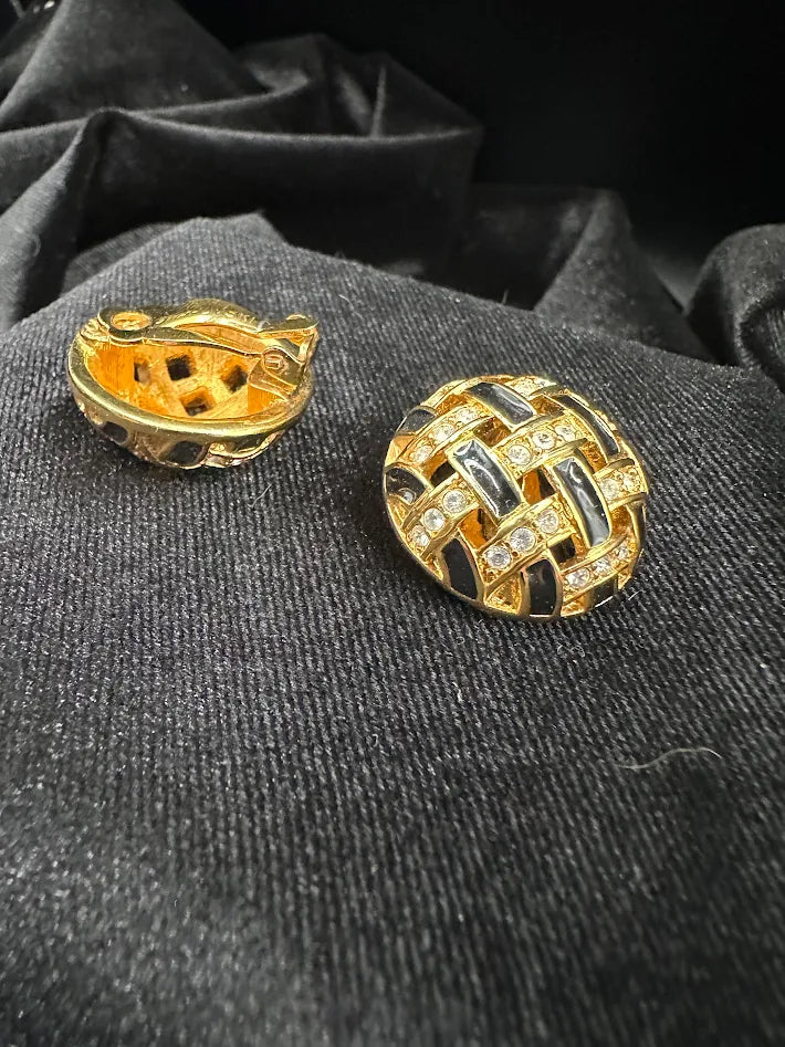 Signed Swarovski gold-tone woven dome clip earrings with clear crystals and black enamel, view 2