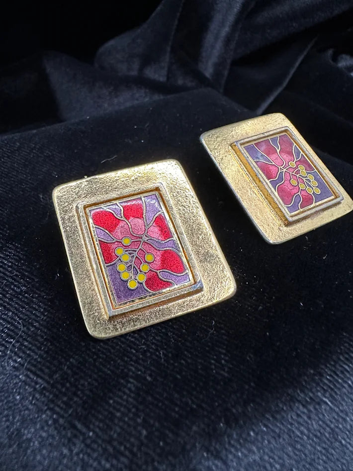 Signed Laurel Burch gold-tone rectangular clip earrings with pink, purple and yellow floral enamel, view 4