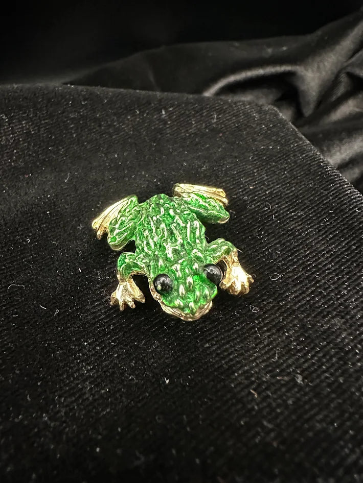 (SWAROVSKI) Gold tone green enamel frog brooch with black eyes