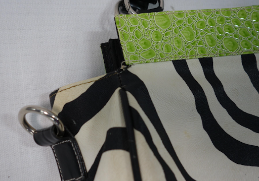 Large zebra print tote with pink and green croc-embossed trim and black handles, view 4