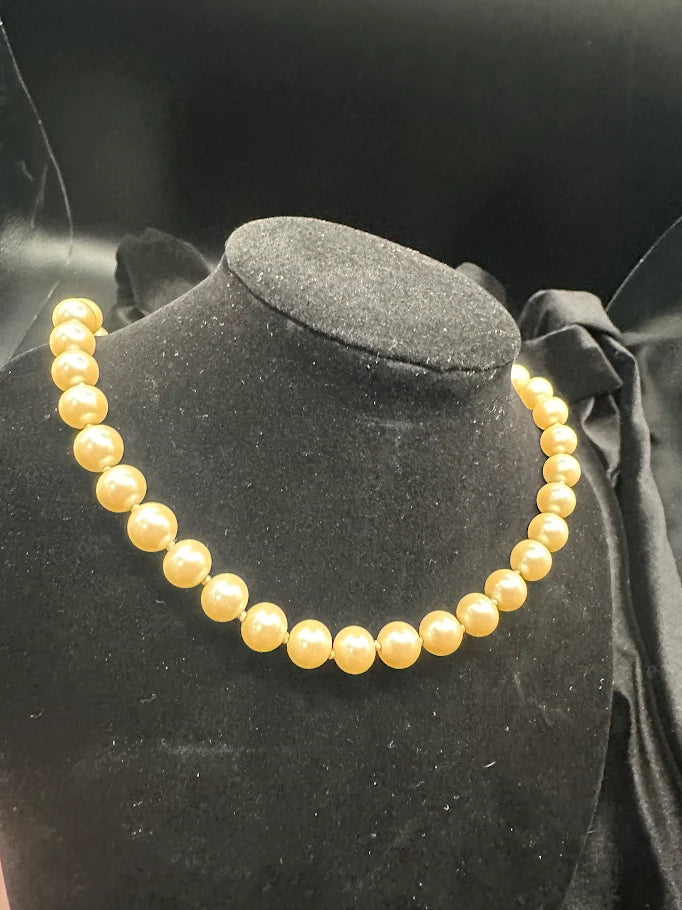 Peach faux pearl single strand necklace with gold-tone crystal accent clasp, view 6