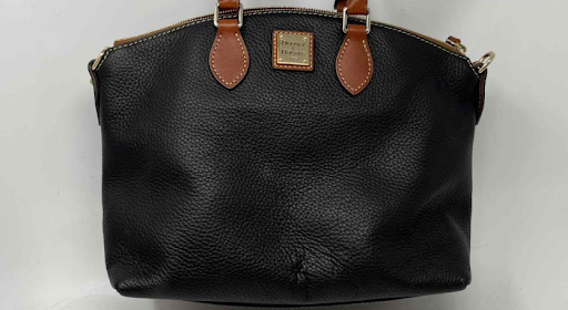 Dooney and Bourke black pebbled leather satchel with cognac brown trim, view 2