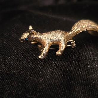 Gold-tone textured squirrel brooch with raised tail and blue eye, view 4