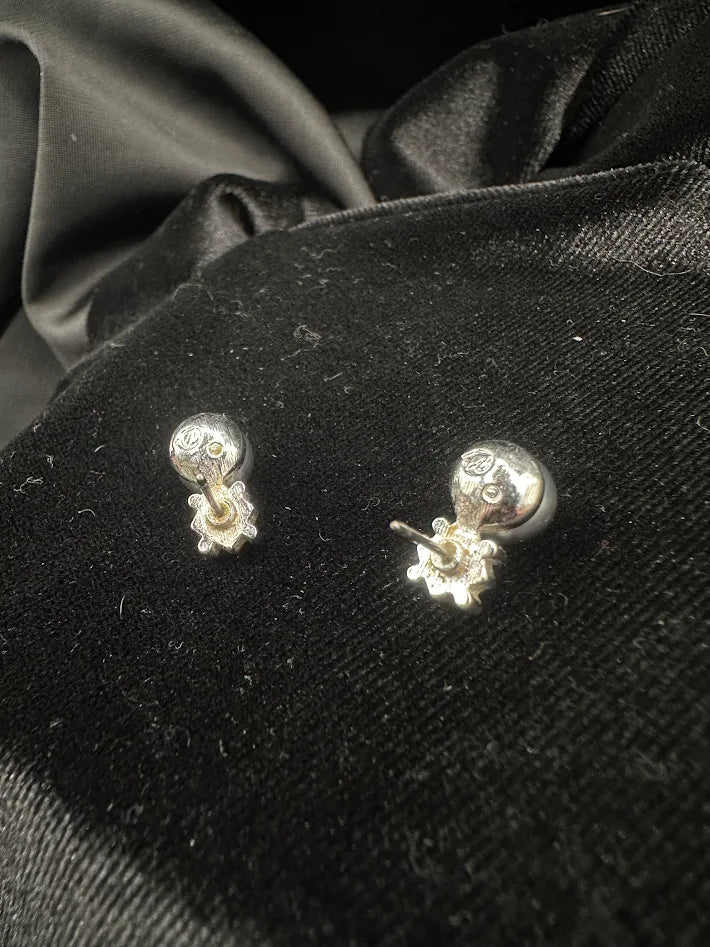 Silver-tone faux pearl stud earrings with geometric accent at the base, view 4