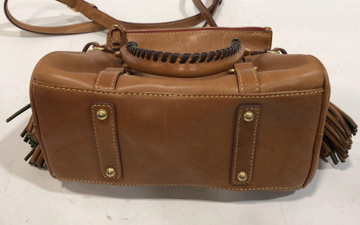 Dooney and Bourke brown Florentine leather satchel with tassels and braided handles, view 6