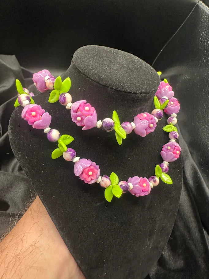Pink and Purple Flower Bead Necklace with Green Leaf Accents  Description
