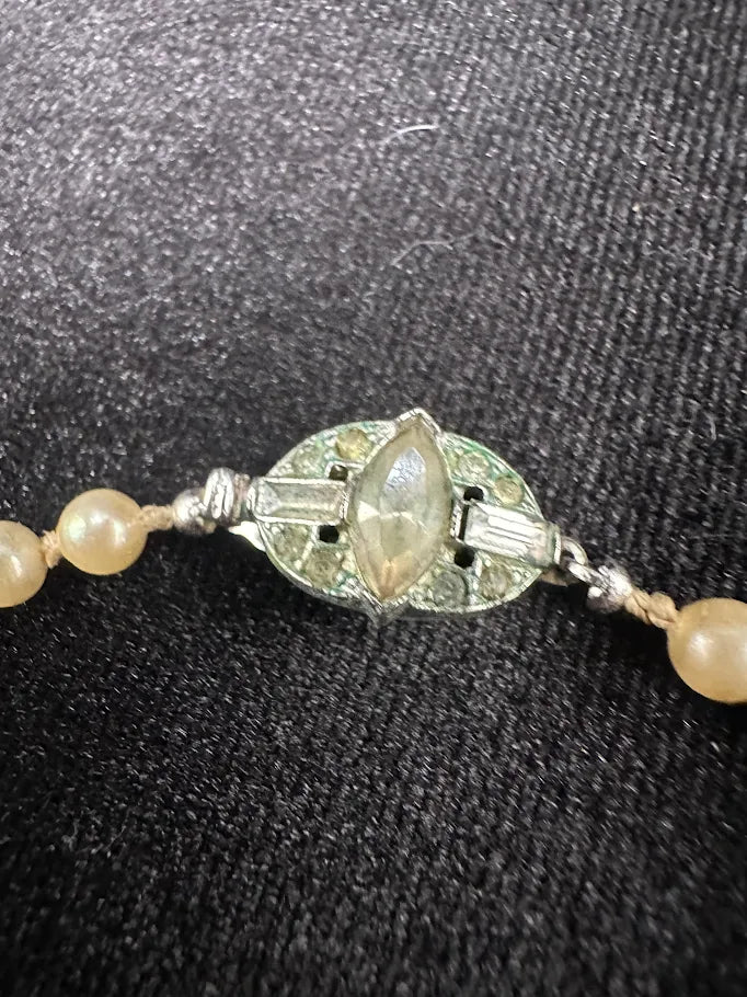 Single strand cream faux pearl necklace with gold-tone crystal accent clasp, view 2