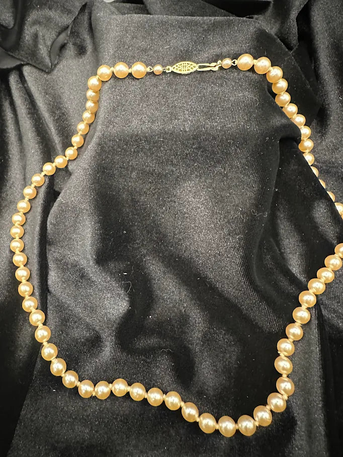 Single strand cream faux pearl necklace with gold-tone filigree clasp, view 5
