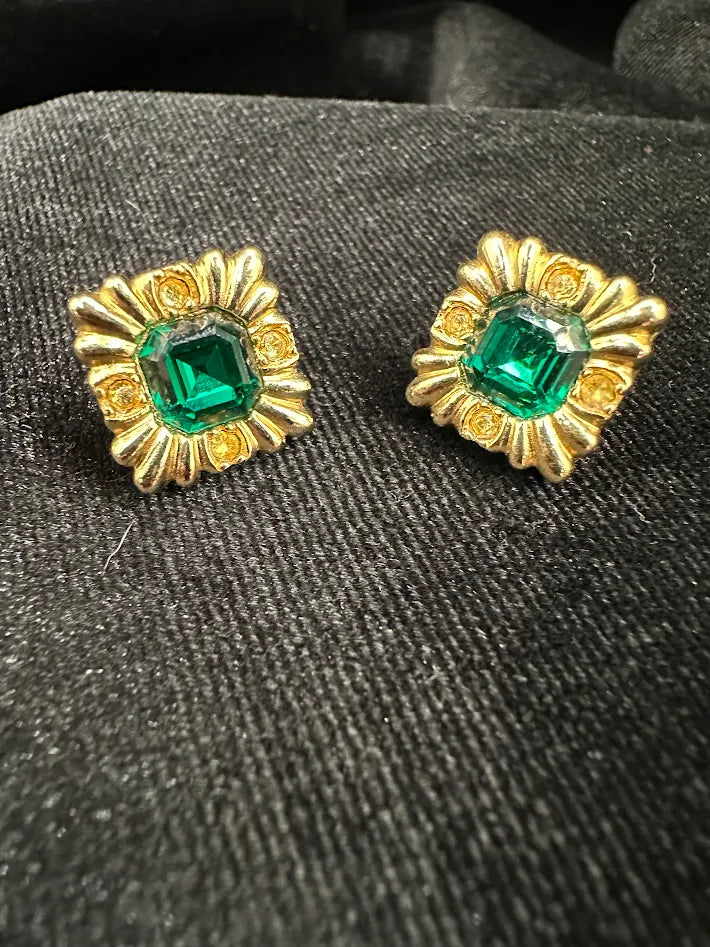 Gold-tone square stud earrings with emerald-cut green crystals in textured frames, view 4